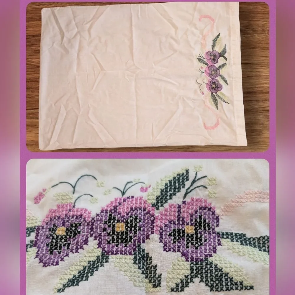 Vintage white pillowcase with embroidered purple flowers
